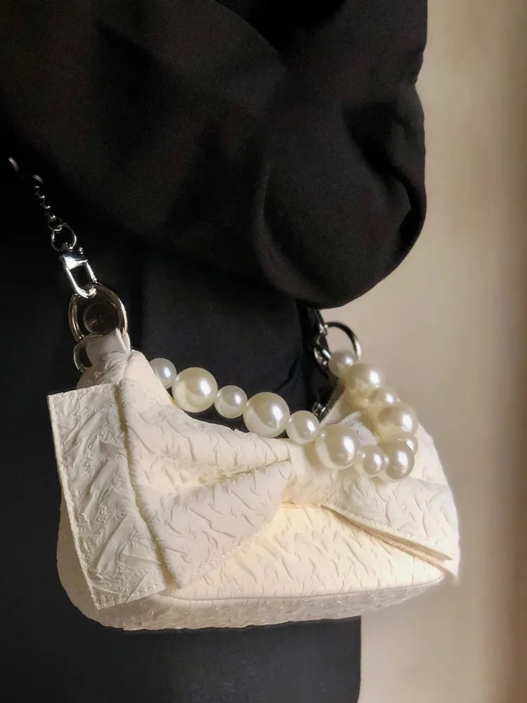Jasmine Nylon Cloth Cream Color Pearl Handle Bow Handbag